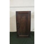 A Mahogany Cabinet with Panelled Door, 65.5cm High