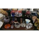 A Tray of Coloured Glassware to Include Overlaid Wines, Vases, Slag Glass Jug, Paperweights etc