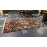 A Patterned Woollen Rug, 3.2m x 2m