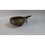 An Early 20th Century African Carved Wooden Blood Letting Bowl with Grooved Handle, 20cm diameter