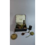 A Vintage Tin Containing Brass Handbell, Cowbell, Copperwares, Lamps and Candle Stands etc