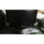 A Samsung 21" Flat Screen TV with Remote
