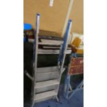 An Aluminum Two Step Decorators Ladder