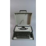 A Vintage AEG Olympia Traveler Deluxe S Manual Portable Typewriter