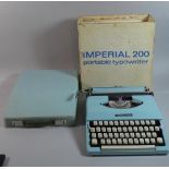 A Vintage Manual Imperial 200 Typewriter with Original Card Board Box