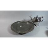 A Large 19th Century Pewter Charger, 41.5cm Diameter Together with a Silver Lustre Ceramic Teapot