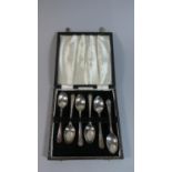 A Cased Set of Six Silver Teaspoons Decorated with Golf Clubs to Finials, Sheffield 1933, 81g