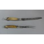 A Silver Mounted Bone Handled Pistol Grip Carving Knife and Fork Set, Sheffield Hallmark