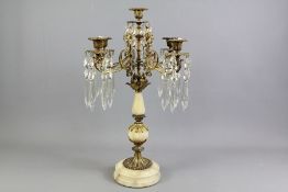 A Marble and Brass Table Candelabra
