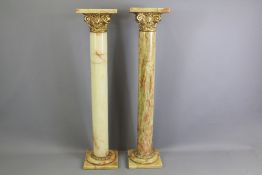 A Pair of Marble and Gilt Plant Stands