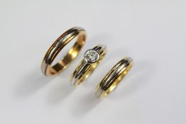 An 18ct Yellow and White Gold Diamond Engagement Set