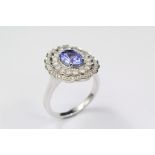 An 18ct White Gold Tanzanite and Diamond Cluster Ring