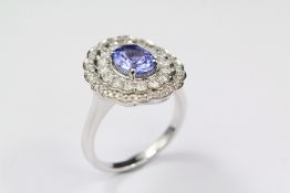 An 18ct White Gold Tanzanite and Diamond Cluster Ring