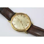 A Gentleman's Omega 18k Constellation Turler Wrist Watch