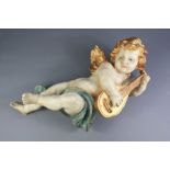 A Contemporary Italian Wood Carved Putti