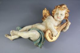 A Contemporary Italian Wood Carved Putti