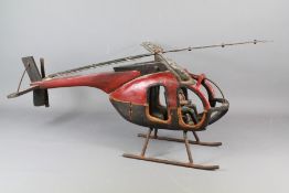 A Hand Made Wood Carved Helicopter