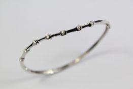 An 18ct White Gold and Diamond Bracelet