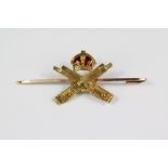 A 14ct Yellow Gold and Enamel Machine Gun Corps Brooch.