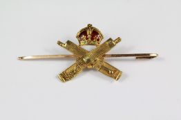 A 14ct Yellow Gold and Enamel Machine Gun Corps Brooch.