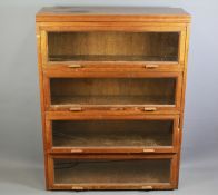 A Pair of Oak Globe-Wernicker Style Book Case