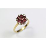 A Vintage 18ct Gold Ruby and Diamond Cluster Ring