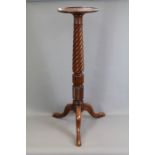 A Vintage Carved Mahogany Torchere