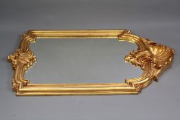 A Contemporary Gilt Composite Baroque-Style Wall Mirror