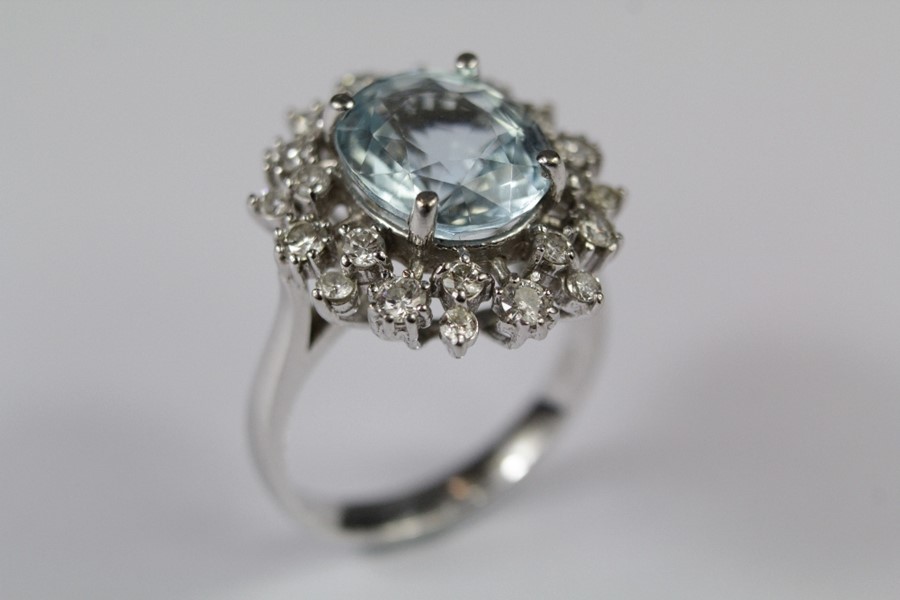 A 14ct White Gold Aquamarine and Diamond Cluster Ring