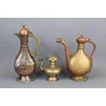 Two Islamic Copper and Brass Ewers, and an animal spout lotta