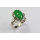 An 18ct White Gold and Apple Green Jade Ring