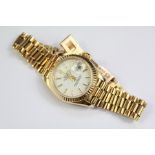 A Rolex Oyster 18ct Yellow Gold Lady's Perpetual Date Just Wrist Watch