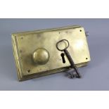 A Large Brass Door Lock and Key