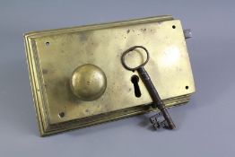 A Large Brass Door Lock and Key