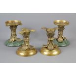 A Set of Four Elegant Classical-Style Candle Holders