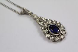 An 18ct White Gold Royal Blue Sapphire and Diamond Tear Drop Pendant