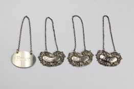 A Set of Victorian Silver Decanter Labels