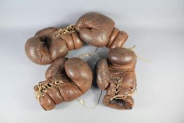 A Pair of Vintage Leather Sparring Boxing Gloves