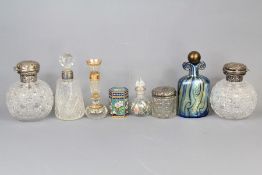 A Pair of Cut-Glass and Silver Scent Bottles