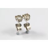 A Pair of White Gold Diamond Stud Earrings