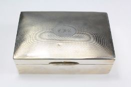 A Silver Engine-Turned Cigarette Box