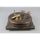 A Georgian Mahogany and Bronze Miniature Desk Cannon