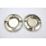 A Pair of Silver Ashtrays