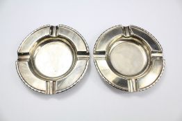 A Pair of Silver Ashtrays