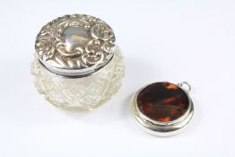 A Silver and Tortoiseshell Miniature Compact Pendant