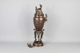 An Antique Oriental Cast Bronze Vase.