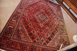 A Vintage Iranian Yoshegan Province Woolen Carpet