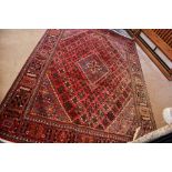 A Vintage Iranian Yoshegan Province Woolen Carpet