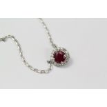 An 18ct White Gold Ruby and Diamond Cluster Pendant Necklace