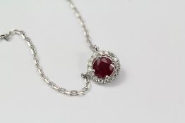 An 18ct White Gold Ruby and Diamond Cluster Pendant Necklace